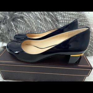 Navy blue patent leather pump. Size 8M